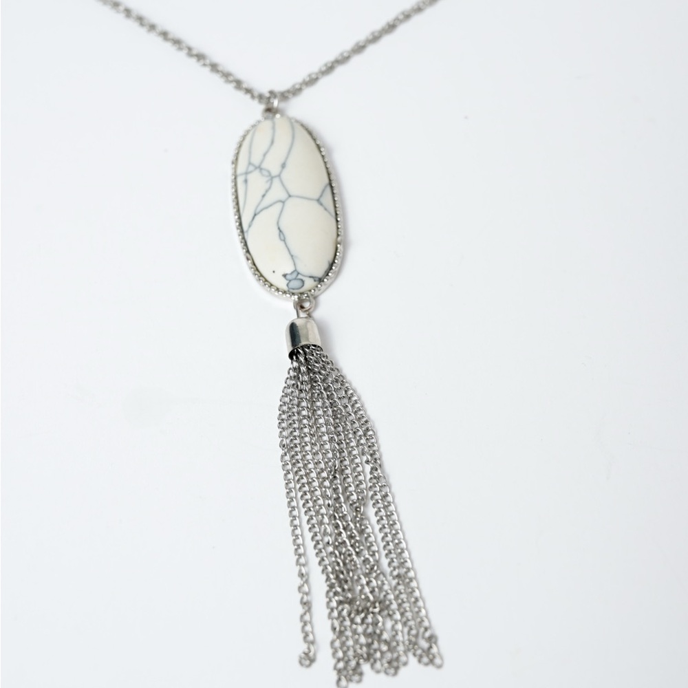 Striking Silver and White Pendant Necklace with Tassel